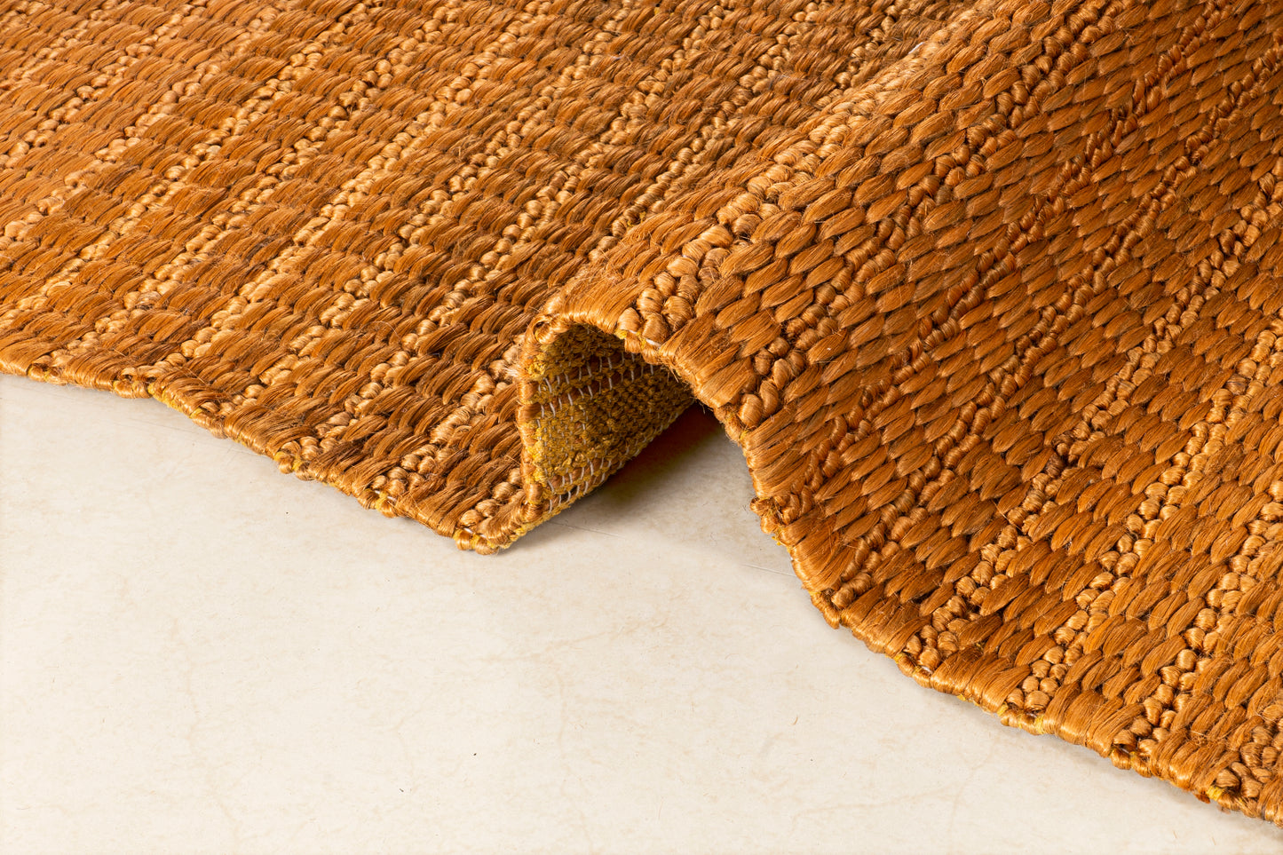 Amber Weave Handwoven Jute Accent Rug – Compact Elegance 