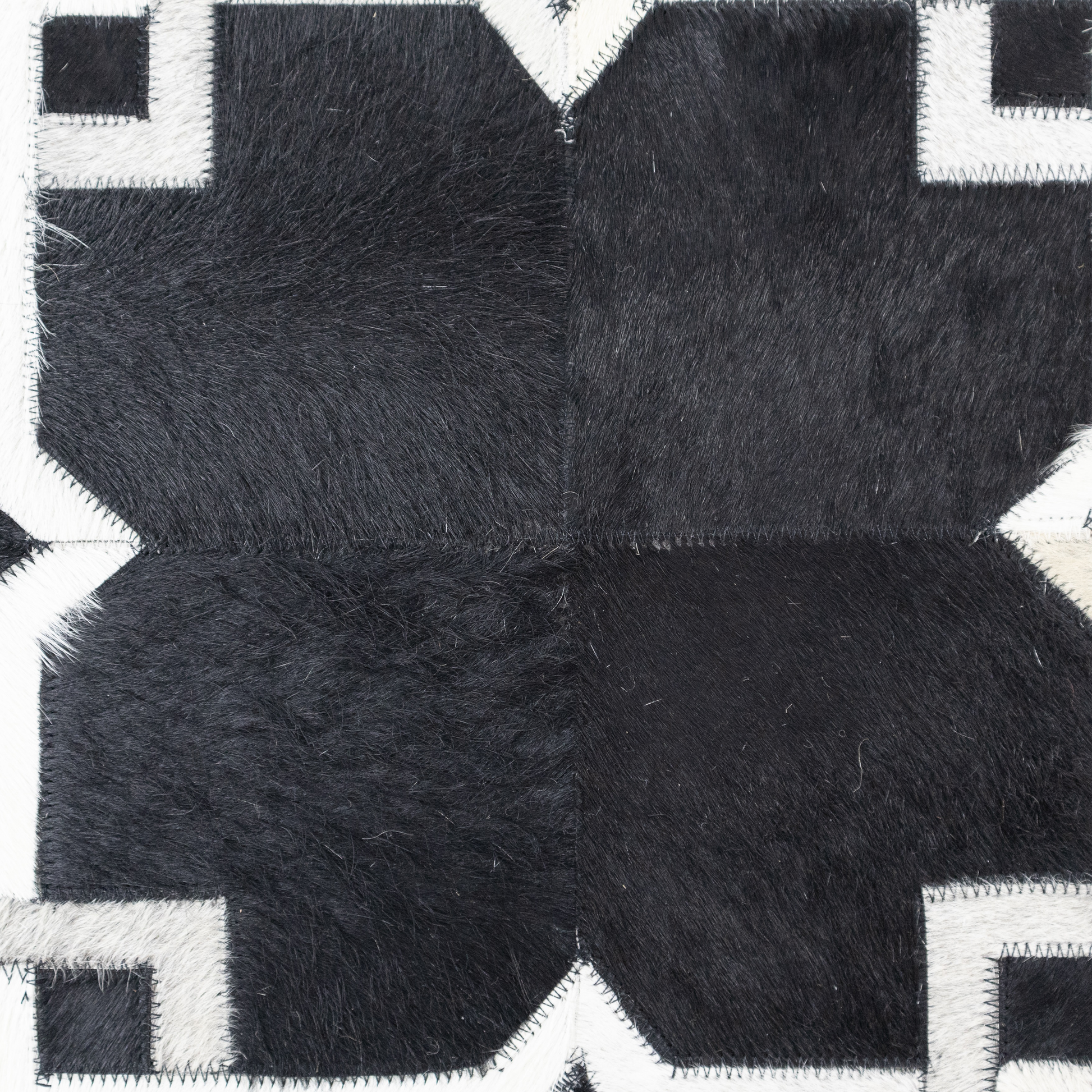 Hand-Woven Black and White Tangled Geometric Leather Area Rug